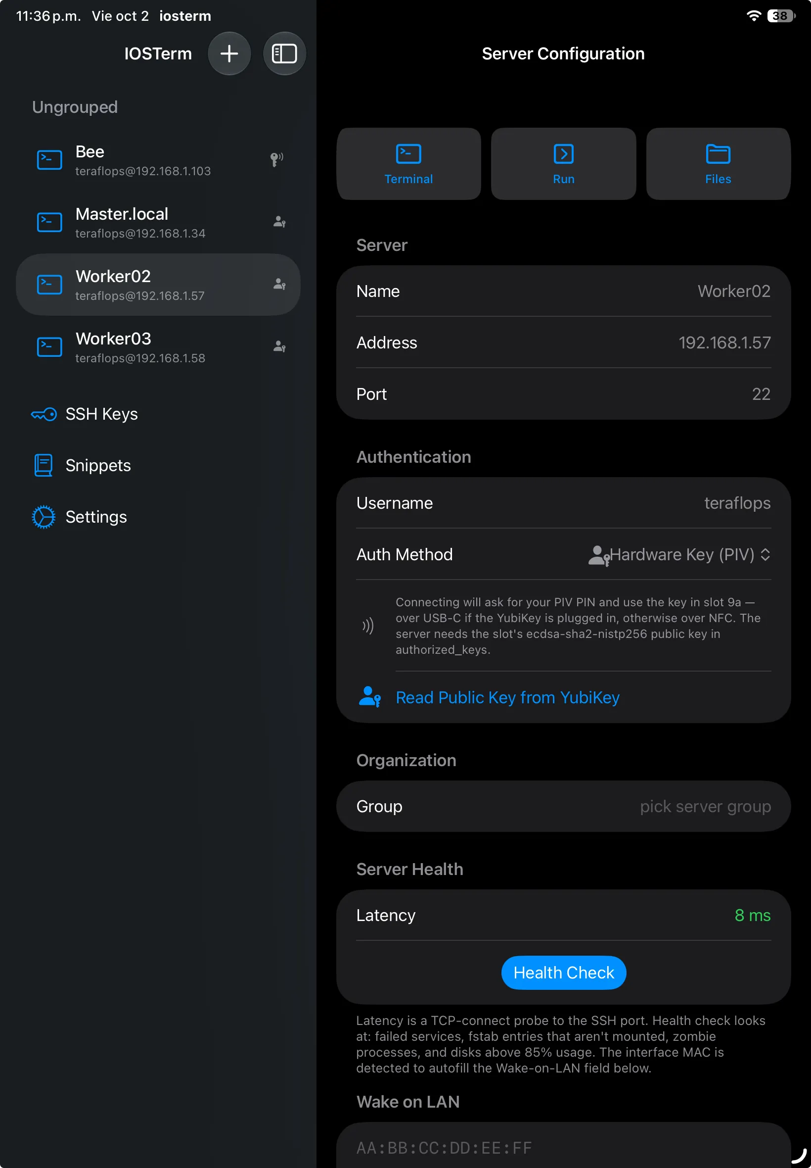 IOSTerm server configuration on iPad with Hardware Key (PIV) selected, the help text naming the key the server needs, and the Read Public Key from YubiKey button