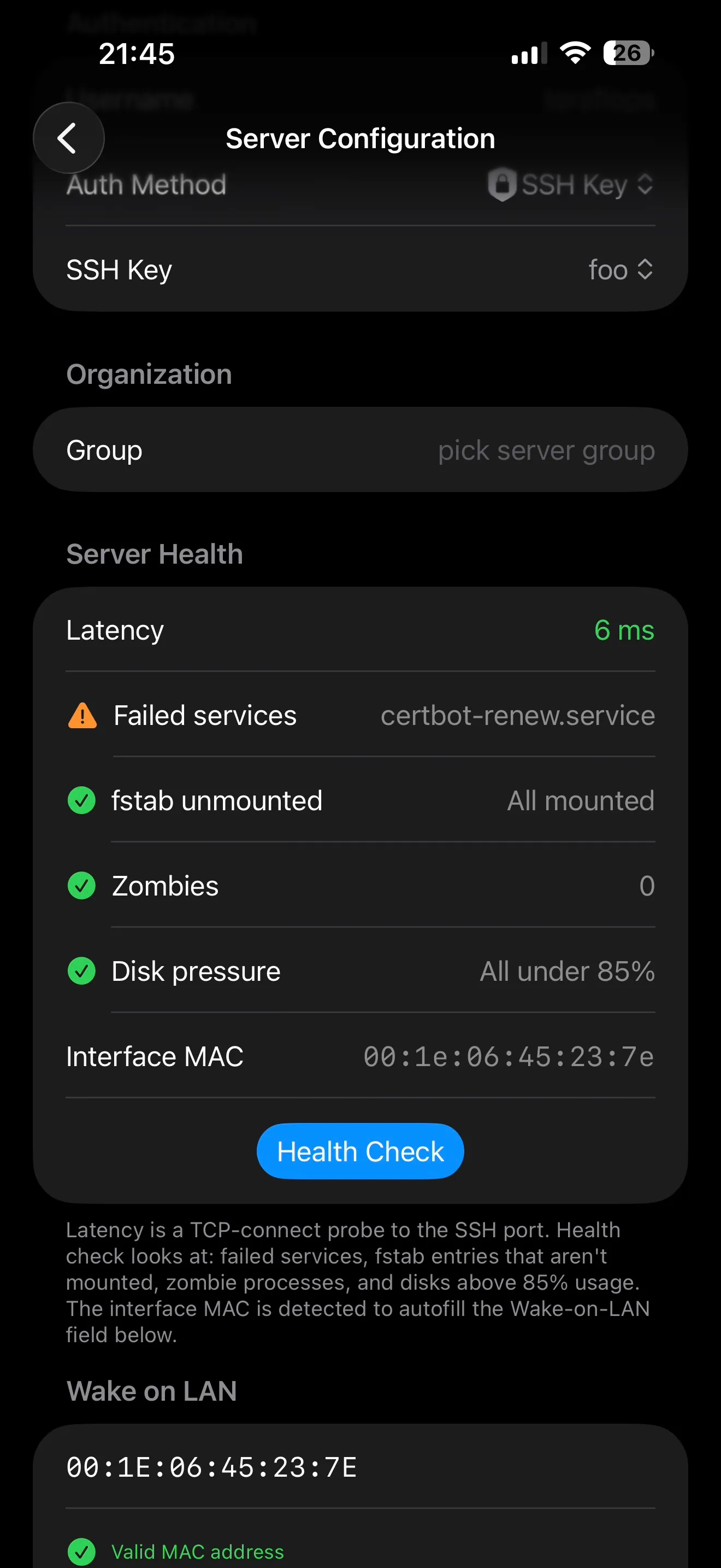 IOSTerm server configuration on iPhone showing the Server Health card: latency, a failed certbot-renew service, fstab, zombies, disk pressure, the interface MAC and the Wake-on-LAN field